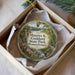 A round ornament with a scenic image of Pennsylvania State Park, featuring a river, trees, and a bridge.