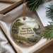 A decorative ornament with a scenic landscape of Moraine State Park, Pennsylvania, featuring a lake, a bridge, and a boat.