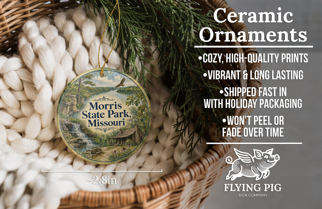 Ceramic ornaments, featuring a detailed image of a scenic landscape with a river and a house, are displayed in a woven basket.