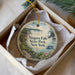 A decorative ornament in a white box, featuring a scenic image of Niagara Falls State Park, New York.