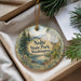 A decorative ornament with a scenic landscape of trees, mountains, and water, featuring the text "Nolte State Park, Washington" on it.