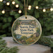 A round ornament with a scenic image of a lake and a bridge, surrounded by greenery, with the text "NORRIS DAM STATE PARK, TENNESSEE" displayed prominently.