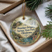 A decorative ornament with a scenic image of Okmulgee Drip Springs State Park, Oklahoma, hanging from a string.