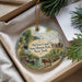 A decorative ornament featuring a scenic image of the Old Erie Canal in New York, with a horse and carriage in the foreground and buildings in the background.