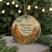 A circular ornament with a scenic illustration of the Palo Duro Canyon State Park in Texas, featuring a bird in flight and desert landscape elements.