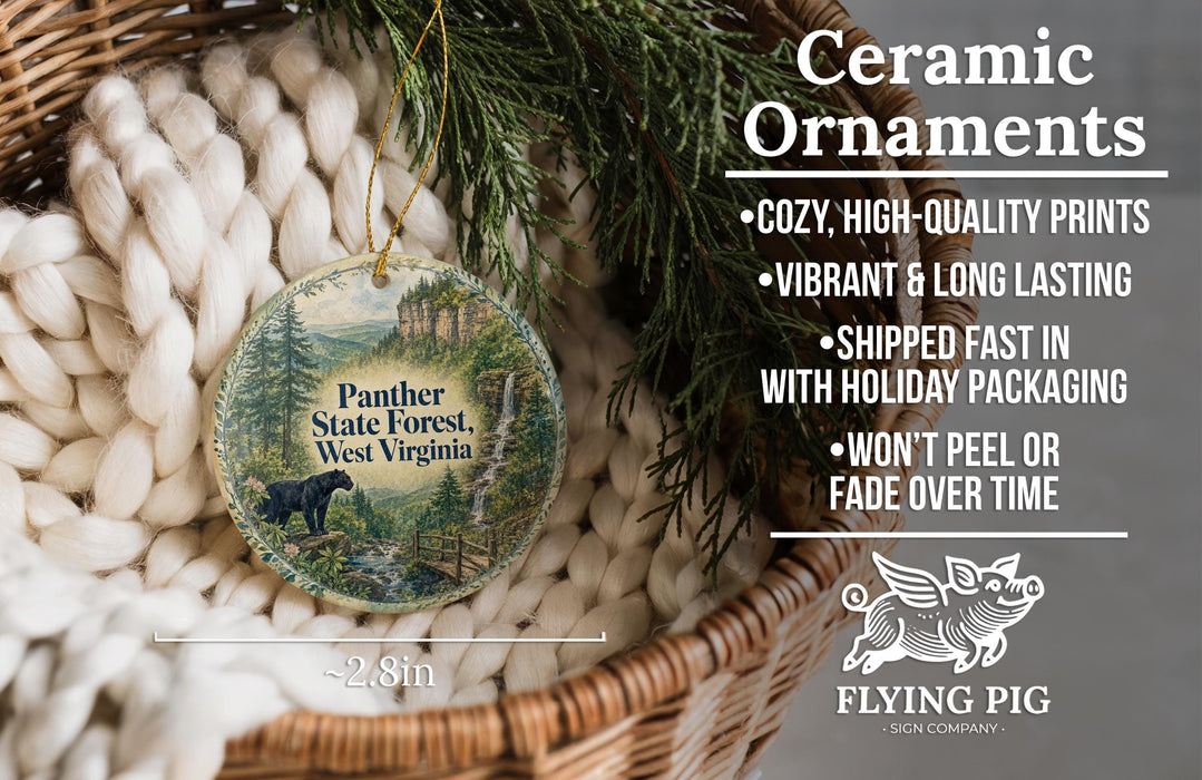 Ceramic ornaments, featuring a black panther in a forest scene, are displayed in a woven basket.