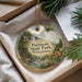 A decorative ornament with a scenic landscape of Pattison State Park, Wisconsin, featuring a waterfall and pine trees.
