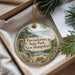A round ornament with a scenic landscape of Pawtucket State Park, New Hampshire, featuring a bird, pine trees, and a picnic table.