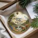 A decorative ornament with a scenic image of Pedernales Falls State Park, Texas, hanging from a string.