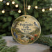 A round ornament with a scenic landscape of Pedernales Falls, State Park, Texas, featuring a bird perched on a tree branch and a waterfall in the background.