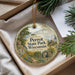 A decorative ornament with a scenic landscape of Perrot State Park, Wisconsin, featuring a lighthouse, trees, and a path.