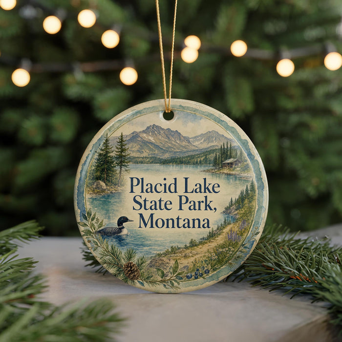 A round ornament with a scenic image of Placid Lake State Park, Montana, featuring a duck and pine trees.