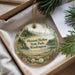 A decorative ornament with a scenic landscape of Pleasant Harbor State Park, Washington, featuring a lighthouse, pine trees, and a body of water.