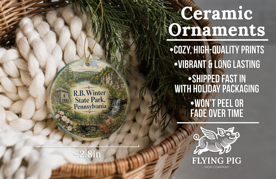 Ceramic ornaments, featuring a scenic image of R.B. Winter State Park, Pennsylvania, hanging from a wicker basket.