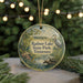 A round ornament with a scenic image of Radnor Lake State Park, Tennessee, featuring a bird, flowers, and a pond.
