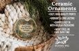 Ceramic ornaments, featuring a round ornament with a scenic image of the Red Bridge State Wayside, Oregon, hanging from a wicker basket.