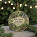 A round ornament with a scenic image of Ridley Creek State Park, Pennsylvania, featuring a house, a bridge, and a waterfall.