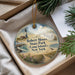 A round ornament with a lighthouse and beach scene, featuring text that reads "Robert Moses State Park (Long Island), New York".