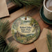 A round ornament with a scenic image of Robert Talbot State Park, Missouri, hanging on a wooden surface.