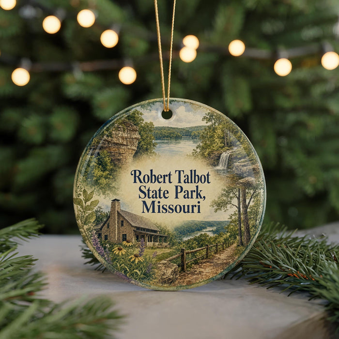 A round ornament featuring a scenic landscape with a cabin, trees, and a waterfall, with the text "Robert Talbot State Park, Missouri" displayed prominently.