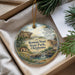 A decorative ornament with a scenic landscape of Roman Nose State Park, Oklahoma, featuring a small cabin and a waterfall.