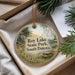 A round ornament with a scenic image of Roy Lake State Park, South Dakota, hanging from a string.