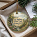 A decorative ornament with a scenic landscape of Salt Springs State Park, Pennsylvania, featuring a waterfall, pine trees, and a house.