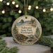 A round ornament with a scenic landscape of Saltwater State Park, Washington, featuring a bird, pine trees, and a body of water.