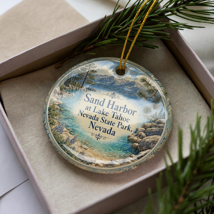 A decorative ornament with a scenic landscape of Lake Tahoe and Nevada State Park, featuring a sandy beach, mountains, and pine trees.
