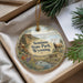 A decorative ornament with a scenic landscape of Seminoe State Park, Wyoming, featuring a ram in the foreground and a river in the background.
