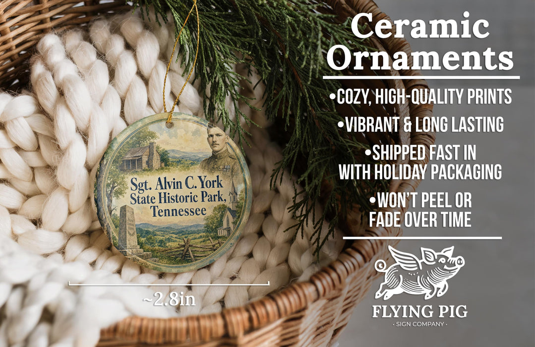 Ceramic ornaments, featuring a round ornament with a picture of a historical park in Tennessee, hanging from a wicker basket.