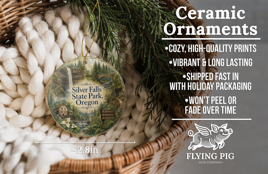 Ceramic ornaments, featuring a scenic image of Silver Falls State Park, Oregon, hanging from a wicker basket.