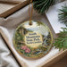 A decorative ornament with a scenic landscape of South Mountains State Park, North Carolina, featuring a bird, flowers, and a waterfall.