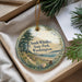 A decorative ornament with a scenic image of South Whidbey State Park, Washington, hanging from a string.