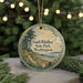 A round ornament with a scenic image of South Whidbey State Park, Washington, hanging from a string.