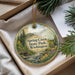 A decorative ornament with a scenic image of Spring Creek State Park, Washington, hanging from a string.