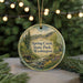 A round ornament with a scenic image of Spring Creek State Park, Washington, featuring a bridge, trees, and a stream.