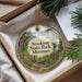 A round ornament with a scenic image of Stockton State Park, Missouri, hanging from a string.