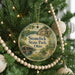 A round ornament hanging on a Christmas tree, featuring a scenic image of Stonelick State Park, Ohio.