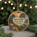 A round ornament with a scenic landscape of Sunset Bay State Park, Oregon, featuring a sunset over the water, pine trees, and a path leading to the park.