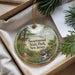 A decorative ornament with a scenic landscape of Swartswood State Park, New Jersey, featuring a winding path, trees, and a small building.