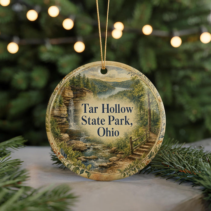 A round ornament with a scenic landscape of a waterfall and forest, featuring the text "Tar Hollow State Park, Ohio" on it.