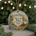 A round ornament with a picture of a historic building and mountains, surrounded by greenery, with the text "This is the Place Heritage Park, Utah" displayed on it.