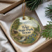 A decorative ornament with a scenic landscape of Tyler State Park, Texas, hanging from a string.