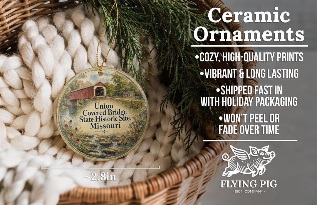 Ceramic ornaments, featuring a detailed image of the Union Covered Bridge in Missouri, are displayed in a woven basket.