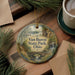 A decorative ornament featuring a scenic landscape of Van Buren State Park, Ohio, with a bridge and waterfalls, surrounded by pine branches and a cup of coffee.