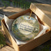 A decorative ornament in a wooden box, featuring a scenic image of Victoria Springs State Recreation Area in Nebraska.