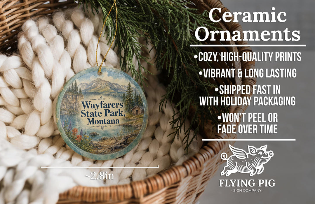 Ceramic ornaments, featuring a round ornament with a scenic image of Wayfarer's State Park, Montana, hanging from a wicker basket.