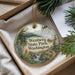 A decorative ornament with a scenic landscape of Wenberg State Park, Washington, featuring a waterfall and pine trees.