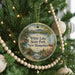 A Christmas tree decorated with ornaments, including a circular ornament with a scenic image of White Lake State Park, New Hampshire.
